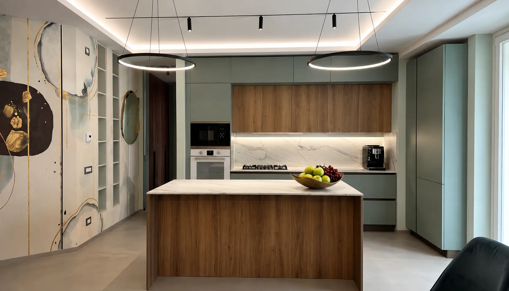 Dettaglio cucina moderna modello Ines verde steppa con isola centrale, top in gres calacatta oro e rovere biondo