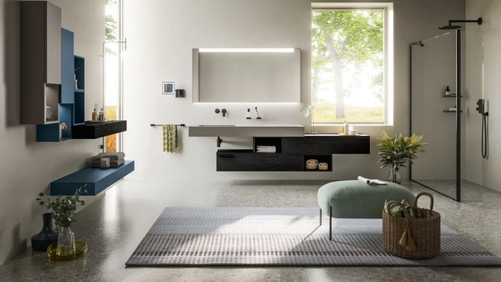 Mobile bagno sospeso Betty di BEHOME con basi sfalsate in legno scuro e top lavabo grigio.